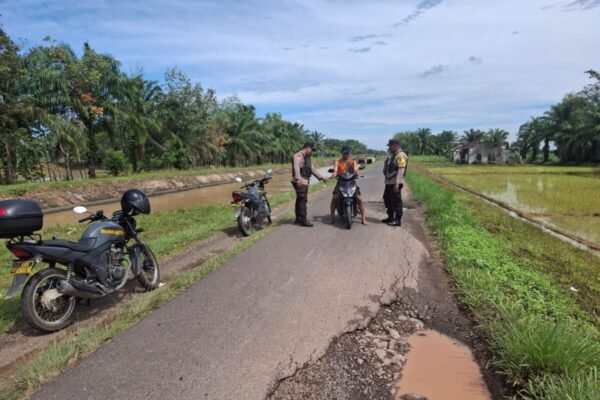 Polisi Gelar Patroli di Jalan Irigasi Bumi Harjo Untuk Minimalisir Kriminalitas